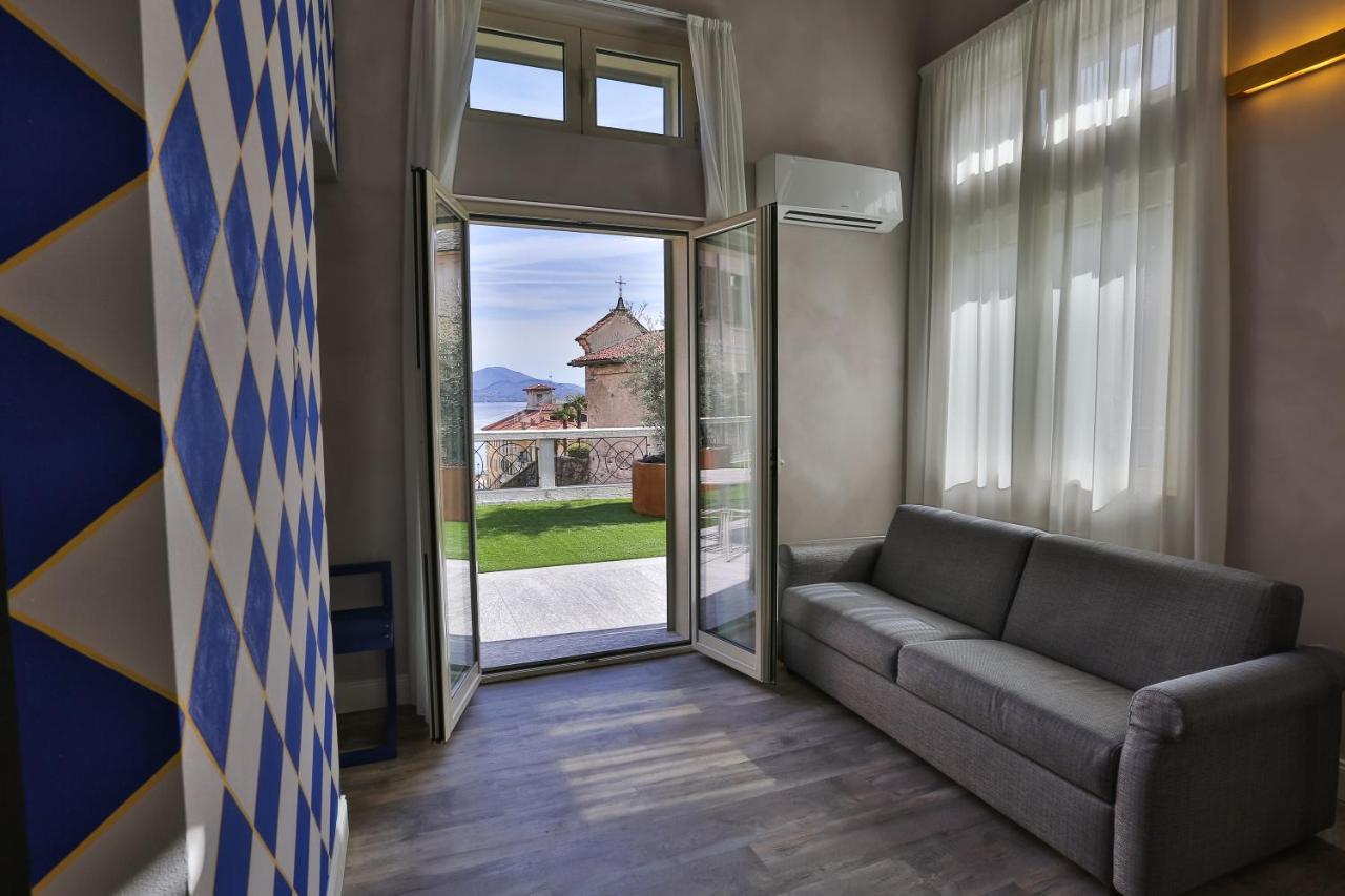 Hotel Al Campanile - Luxury Suites & Apartments Baveno Exteriör bild