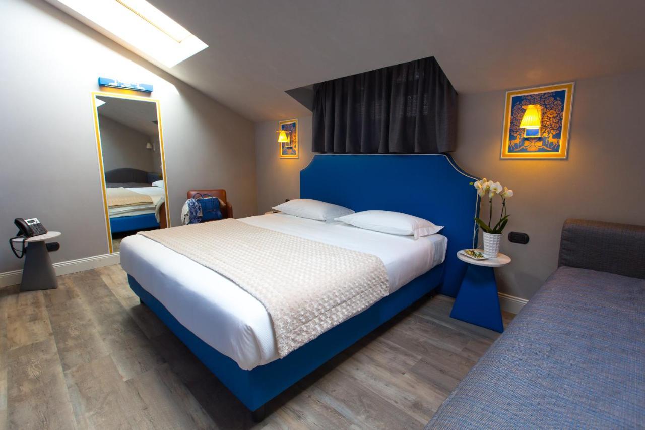 Hotel Al Campanile - Luxury Suites & Apartments Baveno Exteriör bild
