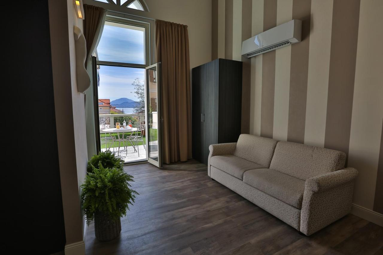 Hotel Al Campanile - Luxury Suites & Apartments Baveno Exteriör bild
