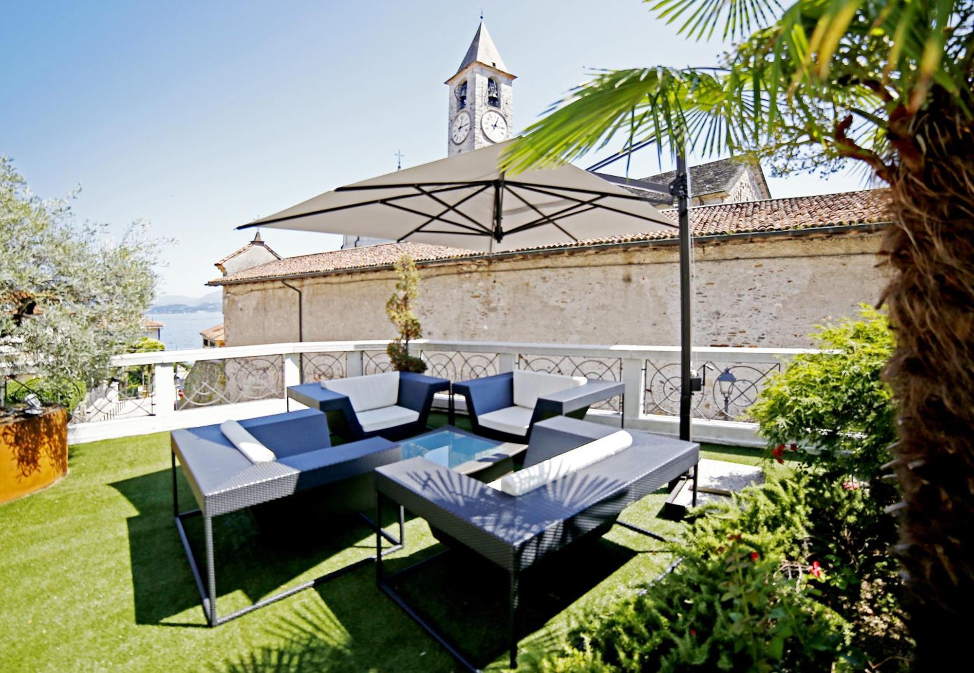 Hotel Al Campanile - Luxury Suites & Apartments Baveno Exteriör bild