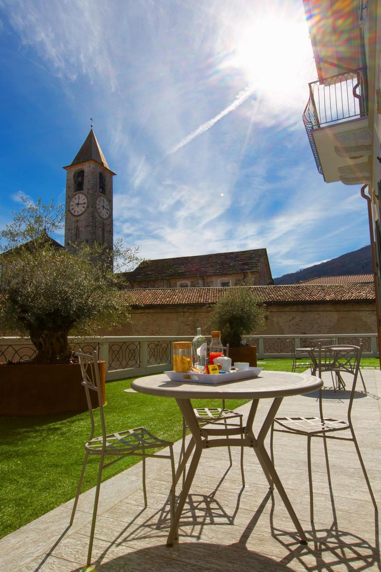 Hotel Al Campanile - Luxury Suites & Apartments Baveno Exteriör bild