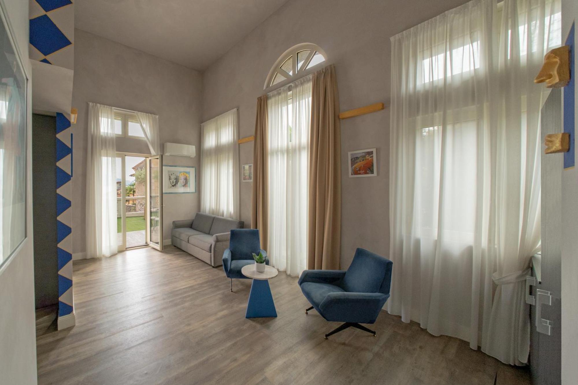 Hotel Al Campanile - Luxury Suites & Apartments Baveno Exteriör bild